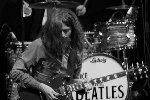 Dan Powell as George Harrsion