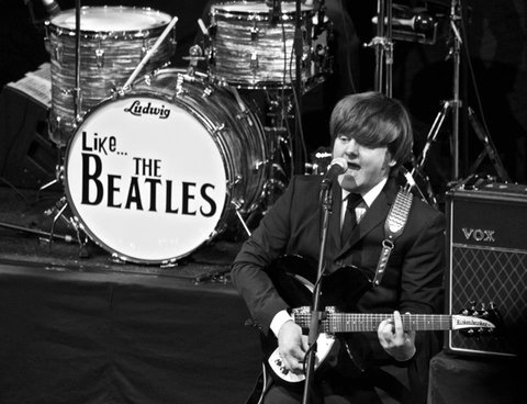 Steve Guest as John Lennon